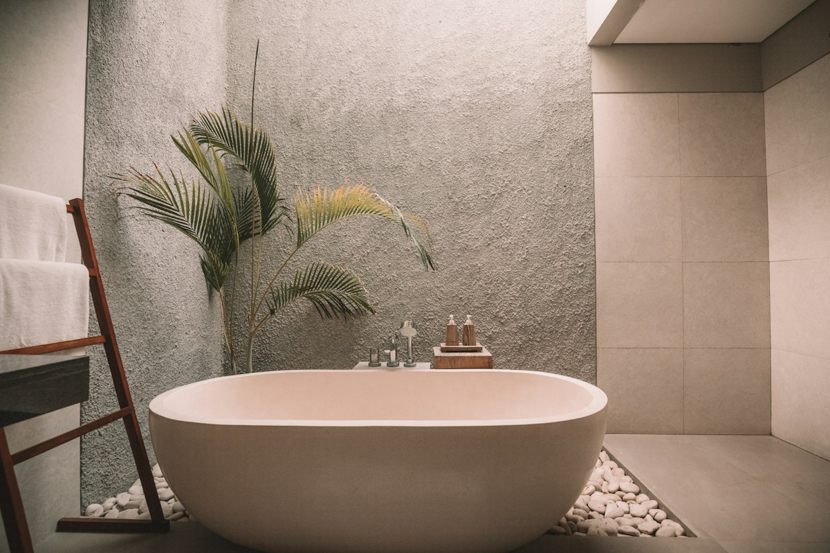 Serene spa wellness water setting with smooth stones representing calm cortisol regulation